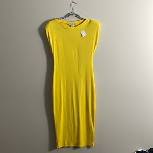 Dress with shoulder pads